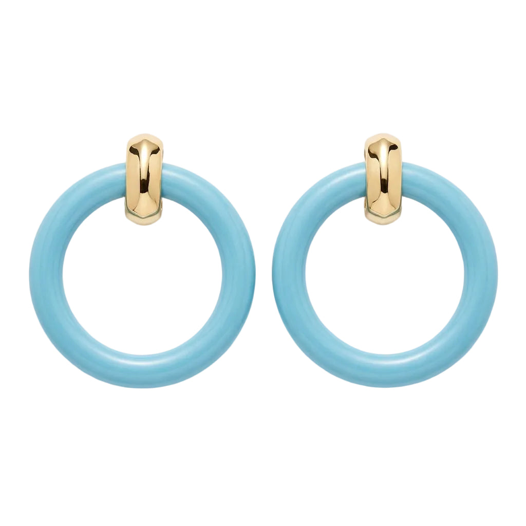 A pair of light blue oval hoop earrings with shiny gold-tone metal clasps, displayed on a beige jewelry card labeled Karen Joy Jones Gold Collection.