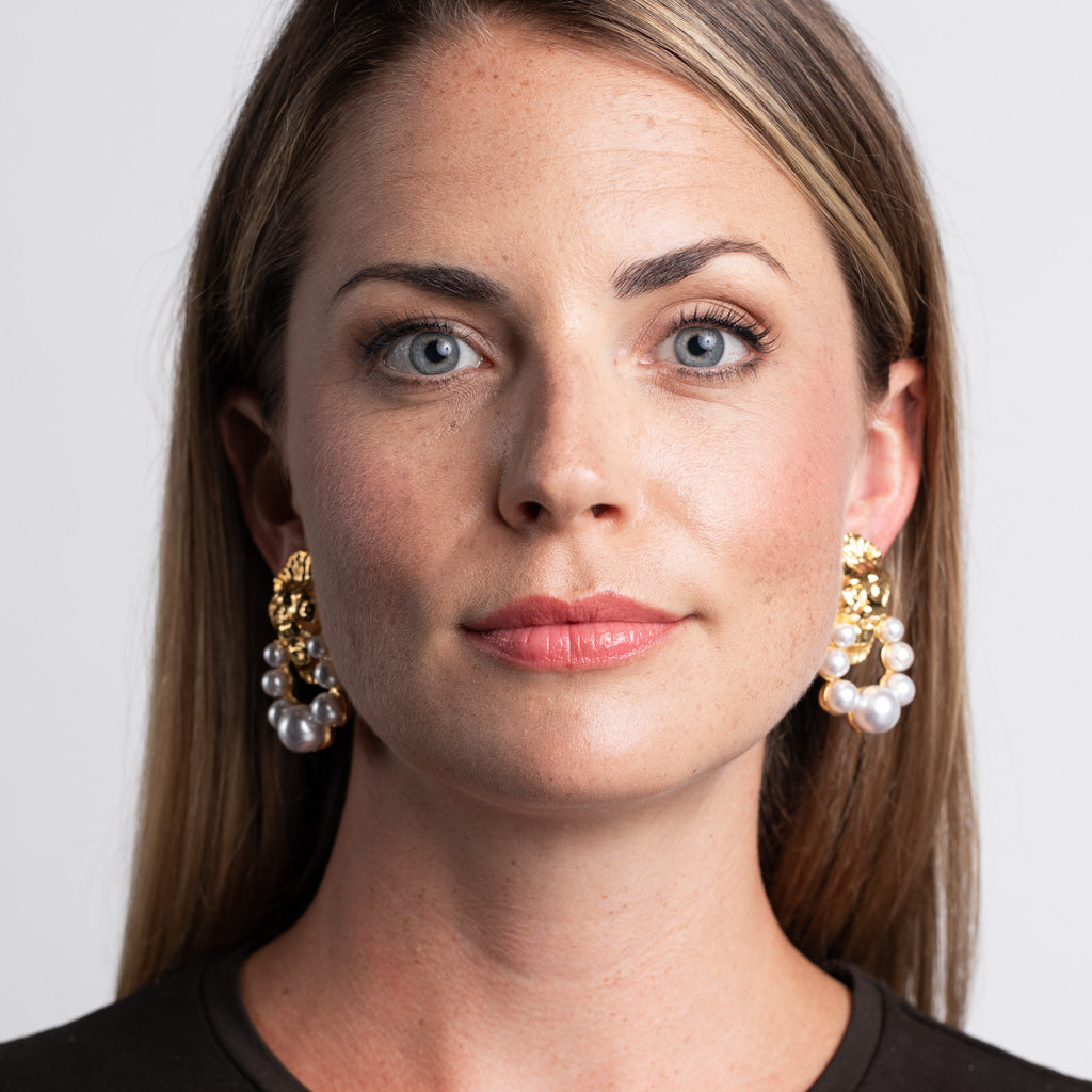 Lion Head and Pearl Earrings Regal Doorknocker Clip Earrings Kenneth Jay Lane Statement Earrings Majestic Lion Motifs Lustrous Pearl Accents Striking Clip-On Earrings Bold and Sophisticated Jewelry Unique Doorknocker Design Powerful Lion Head Charms Gift for Fashion Enthusiasts