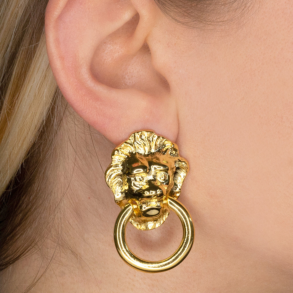 Lionhead Doorknocker Earrings Regal Animal Motif Jewelry Kenneth Jay Lane Statement Earrings Choice of Pierced or Clip Styles Striking Lionhead Design Commanding Presence Earrings Versatile Contemporary Accessories Bold and Majestic Earrings Symbolic Lionhead Jewelry Gift for Confident Fashion Enthusiasts