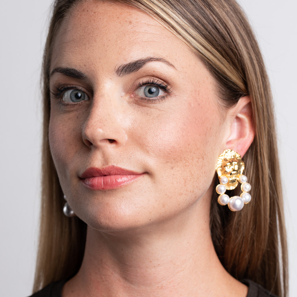 Lion Head and Pearl Earrings Regal Doorknocker Clip Earrings Kenneth Jay Lane Statement Earrings Majestic Lion Motifs Lustrous Pearl Accents Striking Clip-On Earrings Bold and Sophisticated Jewelry Unique Doorknocker Design Powerful Lion Head Charms Gift for Fashion Enthusiasts