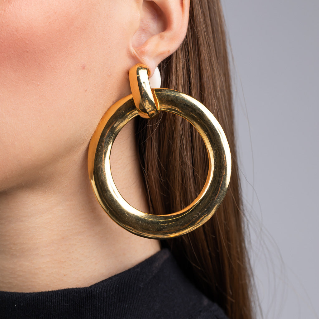 Polished Gold Doorknocker Hoop Clip Earrings Elegance and Refinement Jewelry Kenneth Jay Lane Statement Earrings Chic Doorknocker Hoop Design Lustrous Polished Gold Earrings Comfortable Clip-On Style Versatile Sophisticated Accessories Modern Beauty Hoop Earrings Gift for Style Enthusiasts Polished Gold Earrings with Doorknocker Hoop Design