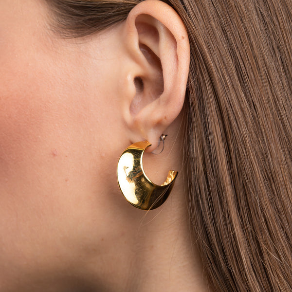 Polished Gold Tapered Hoop Pierced Earrings Elegance and Refined Design Jewelry Kenneth Jay Lane Statement Earrings Chic Gold Tapered Hoop Patterns Lustrous Polished Gold Earrings Comfortable Pierced Style Earrings Versatile Sophisticated Accessories Modern Beauty Tapered Hoop Earring Set Gift for Style Enthusiasts Polished Gold Earrings with Tapered Hoop Designs