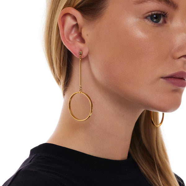 Polished Gold Circle Drop Earrings Timeless and Modern Jewelry Kenneth Jay Lane Statement Earrings Sleek Polished Gold Circles Graceful Drop Earrings Comfortable Fishhook Style Versatile Sophisticated Accessories Refined Gold Circle Earrings Gift for Style Enthusiasts Polished Gold Drop Earrings with Circle Design