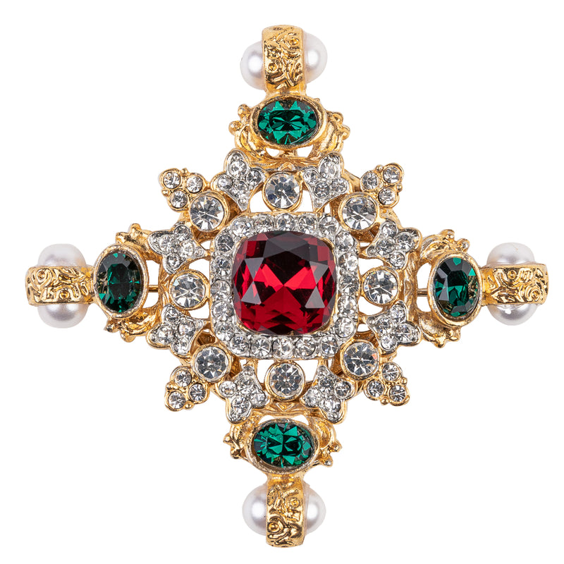 Kenneth Jay Lane 2.5x2.5 Gold with Emerald Side Stones, Ruby Center Crystals and Pearl Ends Maltese Cross Pin Pendant. A stunning gold pendant featuring emerald side stones, a ruby center crystal, and pearl ends. Perfect for everyday wear or special occasions.