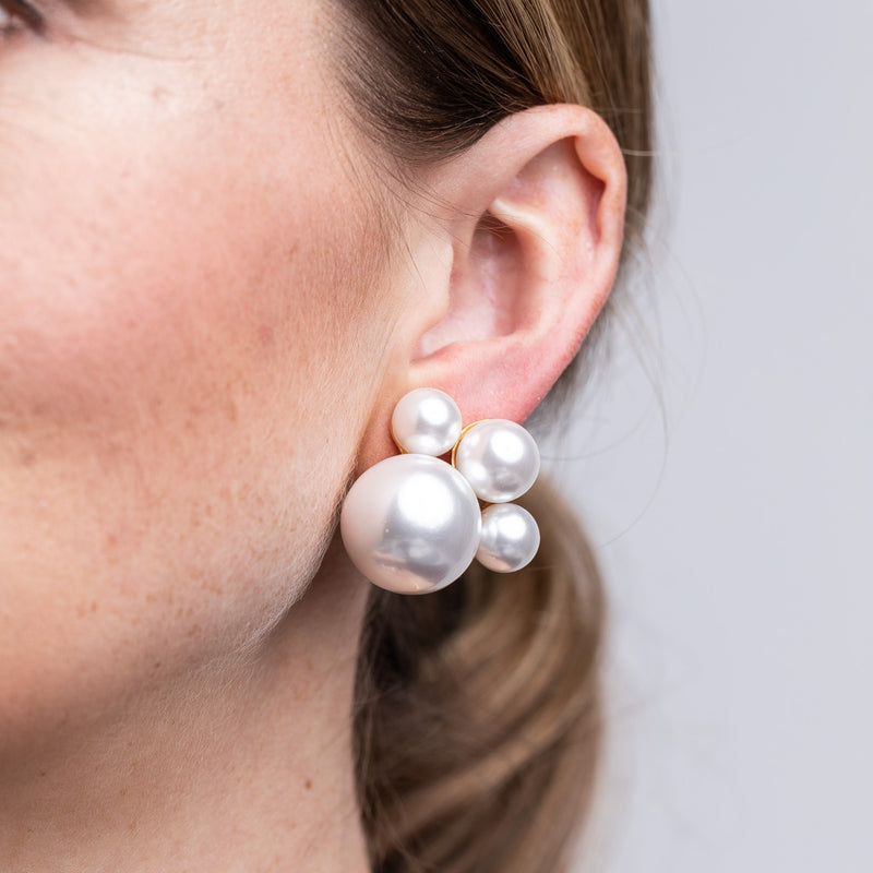 Luxurious Pearl Cluster Clip Earrings Opulent and Refined Jewelry Kenneth Jay Lane Statement Earrings Captivating Pearl Cluster Design Timeless and Classic Elegance Comfortable Clip-On Earrings Versatile Sophisticated Accessories Grand and Sophisticated Earrings Gift for Opulence Enthusiasts Clustered Pearl Statement Earrings