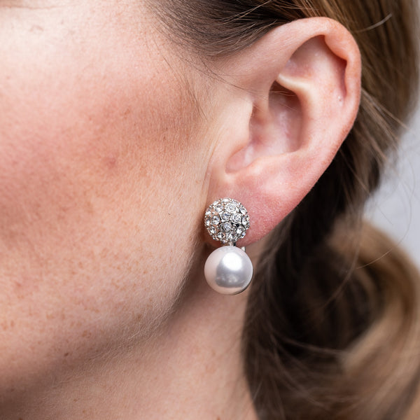 Pave and Pearl Clip Earrings Glamorous and Shimmering Jewelry Kenneth Jay Lane Statement Earrings Shimmering Pave Crystal Accents Lustrous Pearl Embellishments Comfortable Clip-On Earrings Versatile Sophisticated Accessories Timeless Elegance Earrings Gift for Glamour Enthusiasts Sparkling Pave and Pearl Earrings